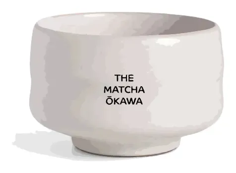 A wide white ceramic bowl on a narrow foot